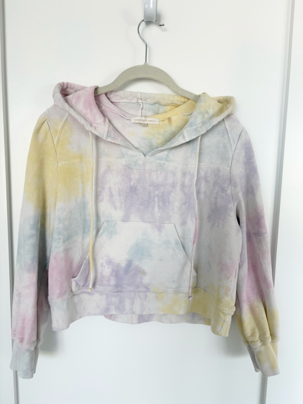 LoveShackFancy cropped tie-dye hoodie in size Medium.